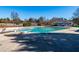 Community swimming pool with diving board and a pool house at 1001 Chimney Hill Dr, Apex, NC 27502