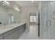 Elegant bathroom, double vanity, and a walk-in shower at 1016 Manor Way, Durham, NC 27701