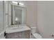Modern bathroom featuring a contemporary vanity, light fixtures, and a toilet at 1016 Manor Way, Durham, NC 27701