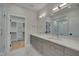 Modern bathroom with double vanity and walk-in shower at 1016 Manor Way, Durham, NC 27701