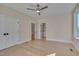 Spacious bedroom with hardwood floors and access to a private bathroom at 1016 Manor Way, Durham, NC 27701