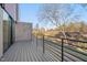 Private deck overlooking wooded area with city views at 1016 Manor Way, Durham, NC 27701