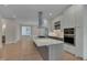 Contemporary kitchen featuring a center island and high-end finishes at 1016 Manor Way, Durham, NC 27701