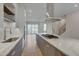 Modern kitchen with a large island and stainless steel appliances at 1016 Manor Way, Durham, NC 27701