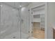 Elegant bathroom with a large walk-in shower and built-in shelving at 1018 Manor Way, Durham, NC 27701