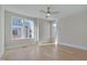 Spacious bedroom with hardwood floors and ceiling fan at 1018 Manor Way, Durham, NC 27701