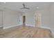 Hardwood floor bedroom with access to bathroom and stairs at 1018 Manor Way, Durham, NC 27701