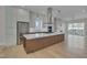 Spacious kitchen with island and stainless steel appliances at 1018 Manor Way, Durham, NC 27701
