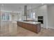 Modern kitchen with stainless steel appliances and an island at 1018 Manor Way, Durham, NC 27701