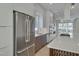 Sleek kitchen with stainless steel appliances and an island at 1018 Manor Way, Durham, NC 27701