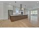 Modern kitchen with stainless steel appliances and an island at 1018 Manor Way, Durham, NC 27701