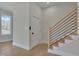 Modern staircase with wood and metal accents at 1018 Manor Way, Durham, NC 27701