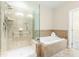 Bathroom with shower, tub, and double vanity at 10511 Sablewood Dr # 110, Raleigh, NC 27617