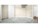 Bedroom featuring a closet, neutral paint, carpeted flooring, and natural light at 10511 Sablewood Dr # 110, Raleigh, NC 27617