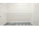 Walk-in closet featuring white wire shelving and bright, neutral colors at 10511 Sablewood Dr # 110, Raleigh, NC 27617