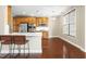 Kitchen with breakfast bar, stainless steel appliances, and lots of storage at 10511 Sablewood Dr # 110, Raleigh, NC 27617