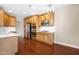 Kitchen boasting stainless appliances, light wood cabinets, and modern lighting fixtures at 10511 Sablewood Dr # 110, Raleigh, NC 27617