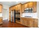 Kitchen boasting stainless steel appliances, light wood cabinets, and white marble countertops at 10511 Sablewood Dr # 110, Raleigh, NC 27617