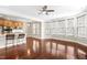 Spacious open floor plan with hardwood floors connecting the living area to a modern kitchen at 10511 Sablewood Dr # 110, Raleigh, NC 27617