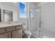 Modern bathroom featuring a glass-enclosed shower and vanity with sink at 107 Barn Door Dr, Lillington, NC 27546