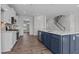 Bright kitchen with a large center island, modern appliances, and an open layout perfect for entertaining at 107 Barn Door Dr, Lillington, NC 27546