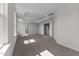 Spacious main bedroom with carpet floors, tray ceiling, and natural light at 107 Barn Door Dr, Lillington, NC 27546