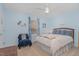 Relaxing bedroom with blue walls, starfish decorations, and comfortable bedding at 112 Wagon Trl, Willow Springs, NC 27592