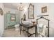 Bathroom with a unique antique vanity, a turquoise cabinet, a decorative mirror, and a vessel sink at 12044 Iredell, Chapel Hill, NC 27517