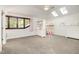Bright bedroom with a loft bed, built-in shelving, and cozy carpet at 12044 Iredell, Chapel Hill, NC 27517
