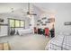 Spacious bedroom featuring two beds, a ceiling fan, and a hammock swing at 12044 Iredell, Chapel Hill, NC 27517