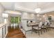 Elegant dining room with fireplace, stylish chandelier, and comfortable seating for dinner parties at 12044 Iredell, Chapel Hill, NC 27517