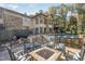 An inviting fire pit and in-ground pool complete the outdoor living space of this impressive property at 12044 Iredell, Chapel Hill, NC 27517