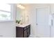Bathroom with vanity and large mirror at 121 Barn Door Dr, Lillington, NC 27546