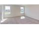 Bright bedroom featuring neutral walls and plush carpeting at 121 Barn Door Dr, Lillington, NC 27546