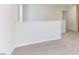 Spacious carpeted bedroom with neutral walls and hallway access at 121 Barn Door Dr, Lillington, NC 27546