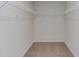Spacious closet with wire shelving for ample storage at 121 Barn Door Dr, Lillington, NC 27546