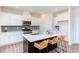 Kitchen island with seating and quartz countertops at 121 Barn Door Dr, Lillington, NC 27546