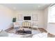 Living area with hardwood floors and a neutral color scheme at 121 Barn Door Dr, Lillington, NC 27546