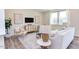 Cozy living room featuring a neutral color palette and hardwood floors at 121 Barn Door Dr, Lillington, NC 27546