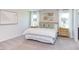 Main bedroom with carpeted floor, neutral tones, and ample natural light at 121 Barn Door Dr, Lillington, NC 27546