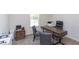 Home office with desk, chairs, and window at 121 Barn Door Dr, Lillington, NC 27546