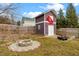 Fenced backyard with shed and fire pit at 1211 E Martin St, Raleigh, NC 27610