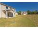 House with backyard, patio, and grassy area at 128 Baird Cv Ln, Angier, NC 27501