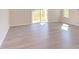 Bright Gathering room with hardwood floors and access to backyard at 128 Baird Cv Ln, Angier, NC 27501
