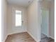 Bright entryway with hardwood floors and access to other rooms at 133 Barn Door Dr, Lillington, NC 27546