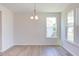 Bright dining room with hardwood floors and large windows at 141 Little Br Dr, Lillington, NC 27546