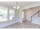 Bright dining room with hardwood floors and large windows at 141 Little Br Dr, Lillington, NC 27546