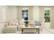 Relaxing living room with sectional sofa and neutral color palette at 149 Kidderminster Ct, Zebulon, NC 27597