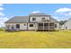 House with large backyard, screened porch, and trampoline at 1505 Montvale Grant Way, Cary, NC 27519