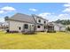 House with large backyard, screened porch, and trampoline at 1505 Montvale Grant Way, Cary, NC 27519